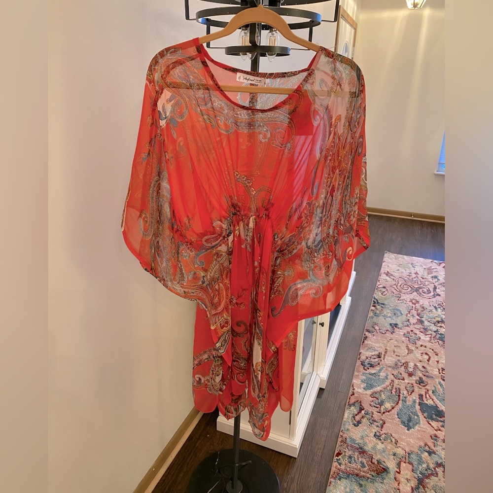 bathing suit coverup in a luscious orange-red tone. One size fits most.